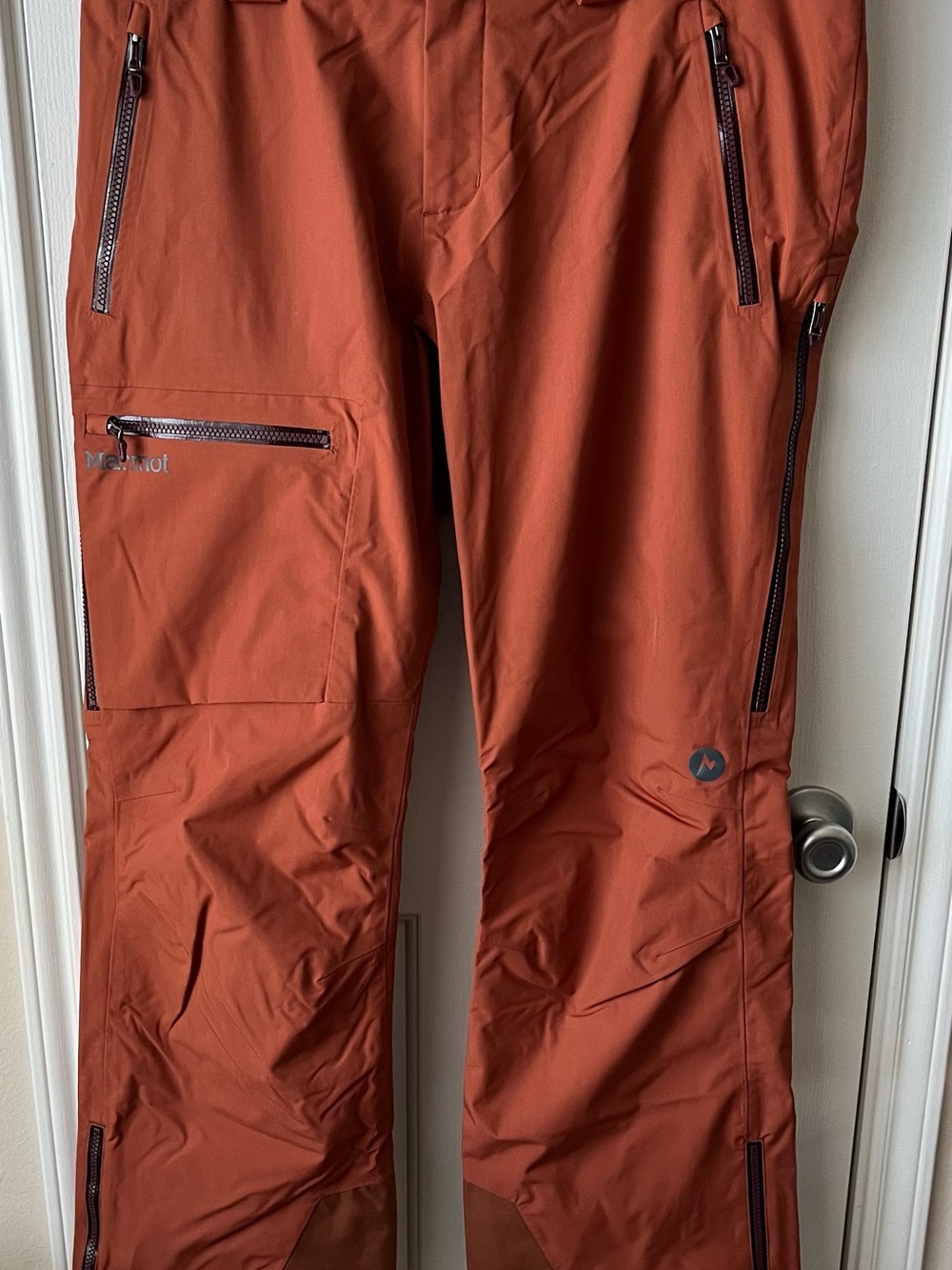 Marmot Men's Burnt Orange Insulated Pants. Size L, 34” inseam.
